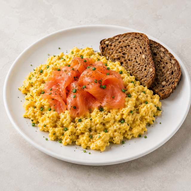 Fried eggs with mushrooms and whole grain bread